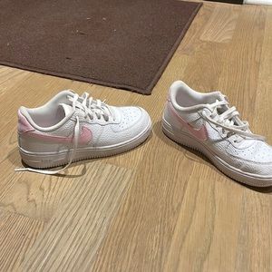 Pink and white Nike air forces